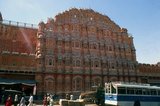 The Hawa Mahal was built in 1799 by Maharaja Sawai Pratap Singh, and designed by Lal Chand Ustad in the form of the crown of Krishna, the Hindu god.<br/><br/>

Jaipur is the capital and largest city of the Indian state of Rajasthan. It was founded on 18 November 1727 by Maharaja Sawai Jai Singh II, the ruler of Amber, after whom the city was named. The city today has a population of 3.1 million. Jaipur is known as the Pink City of India.<br/><br/>

The city is remarkable among pre-modern Indian cities for the width and regularity of its streets which are laid out into six sectors separated by broad streets 34 m (111 ft) wide. The urban quarters are further divided by networks of gridded streets. Five quarters wrap around the east, south, and west sides of a central palace quarter, with a sixth quarter immediately to the east. The Palace quarter encloses the sprawling Hawa Mahal palace complex, formal gardens, and a small lake. Nahargarh Fort, which was the residence of the King Sawai Jai Singh II, crowns the hill in the northwest corner of the old city. The observatory, Jantar Mantar, is a World Heritage Site.